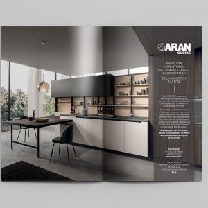 Double page de publicité qui présente le client Aran Cucine qui est concepteur de cuisines